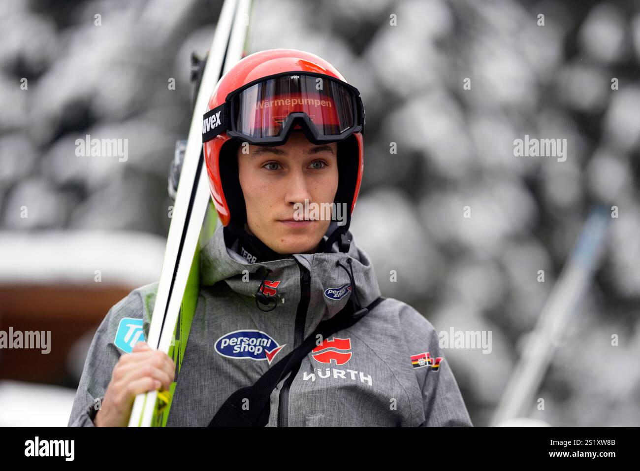 Adrian Tittel, of Germany, arrives for his training jump at the fourth ...