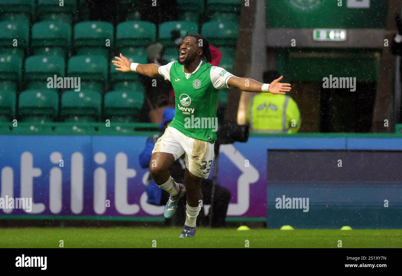 Hibernian's Rocky Bushiri celebrates scoring their side's third goal of ...