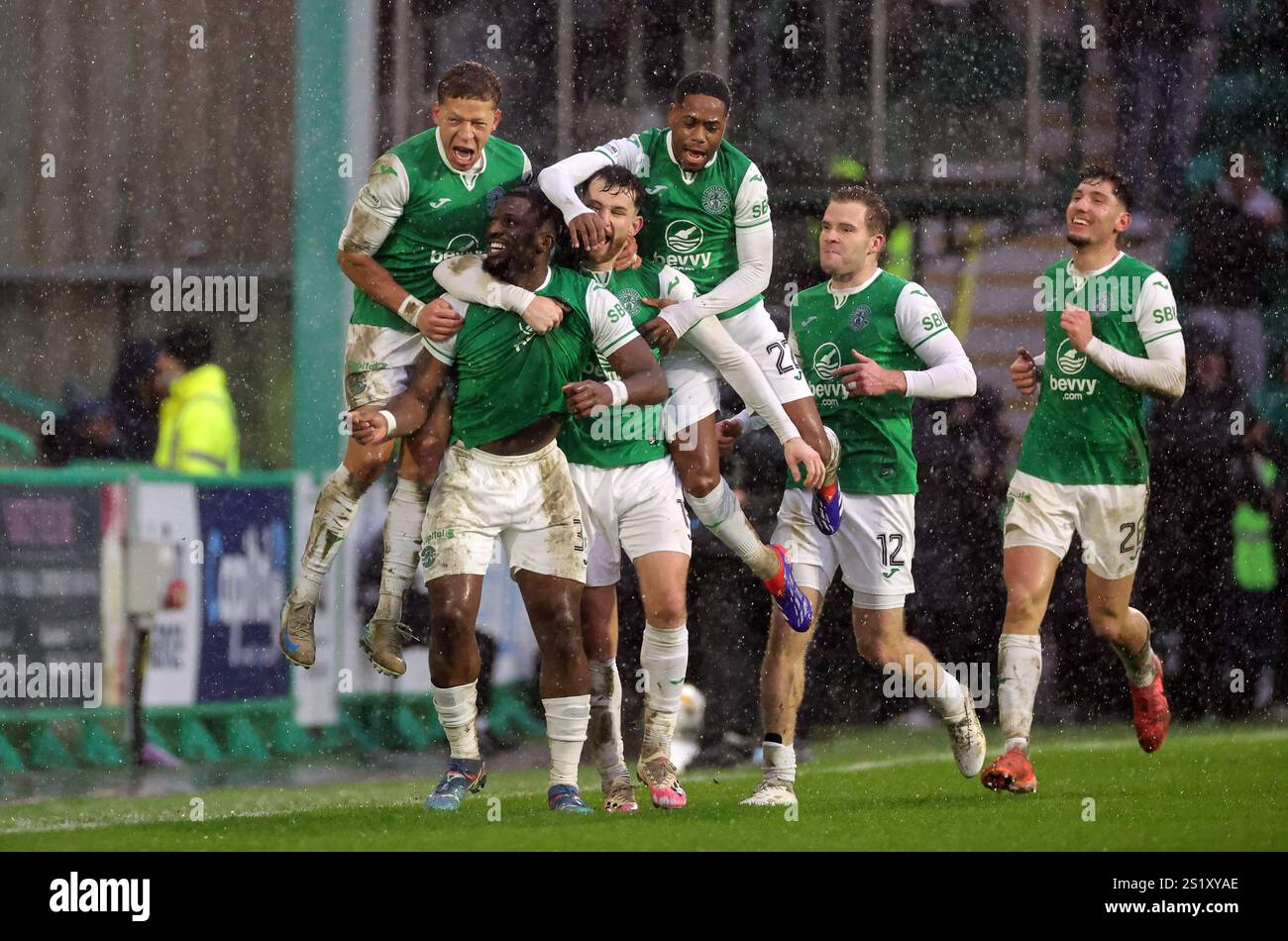 Hibernian's Rocky Bushiri celebrates scoring their side's third goal of ...