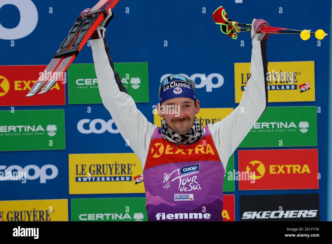 Tour de Ski third placed France's Hugo Lapalus celebrates after the