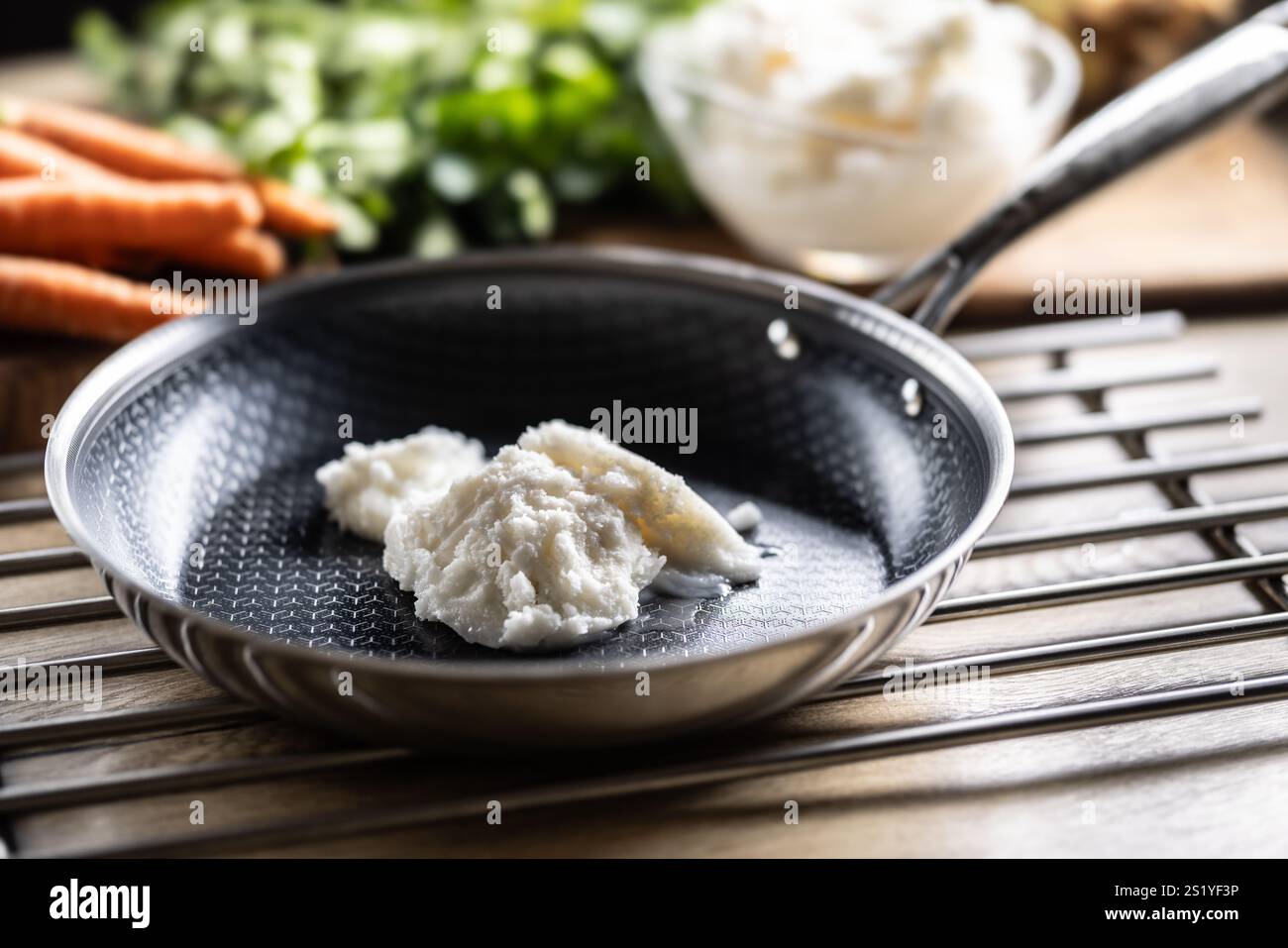 Pork lard in a non-stick cast iron pan. Stock Photo