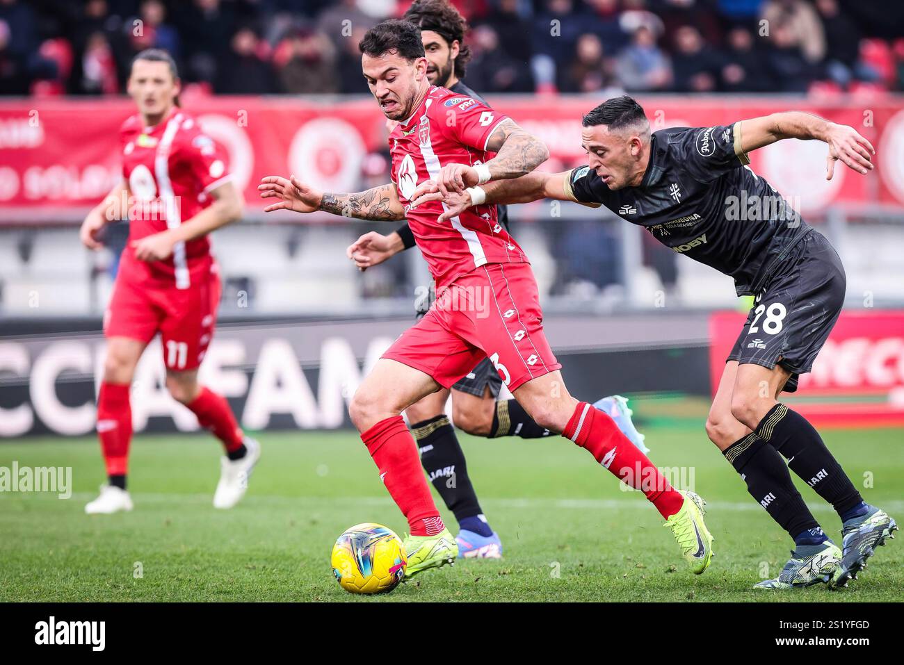 Pedro PEREIRA of AC Monza and Gabriele ZAPPA of Cagliari Calcio during ...