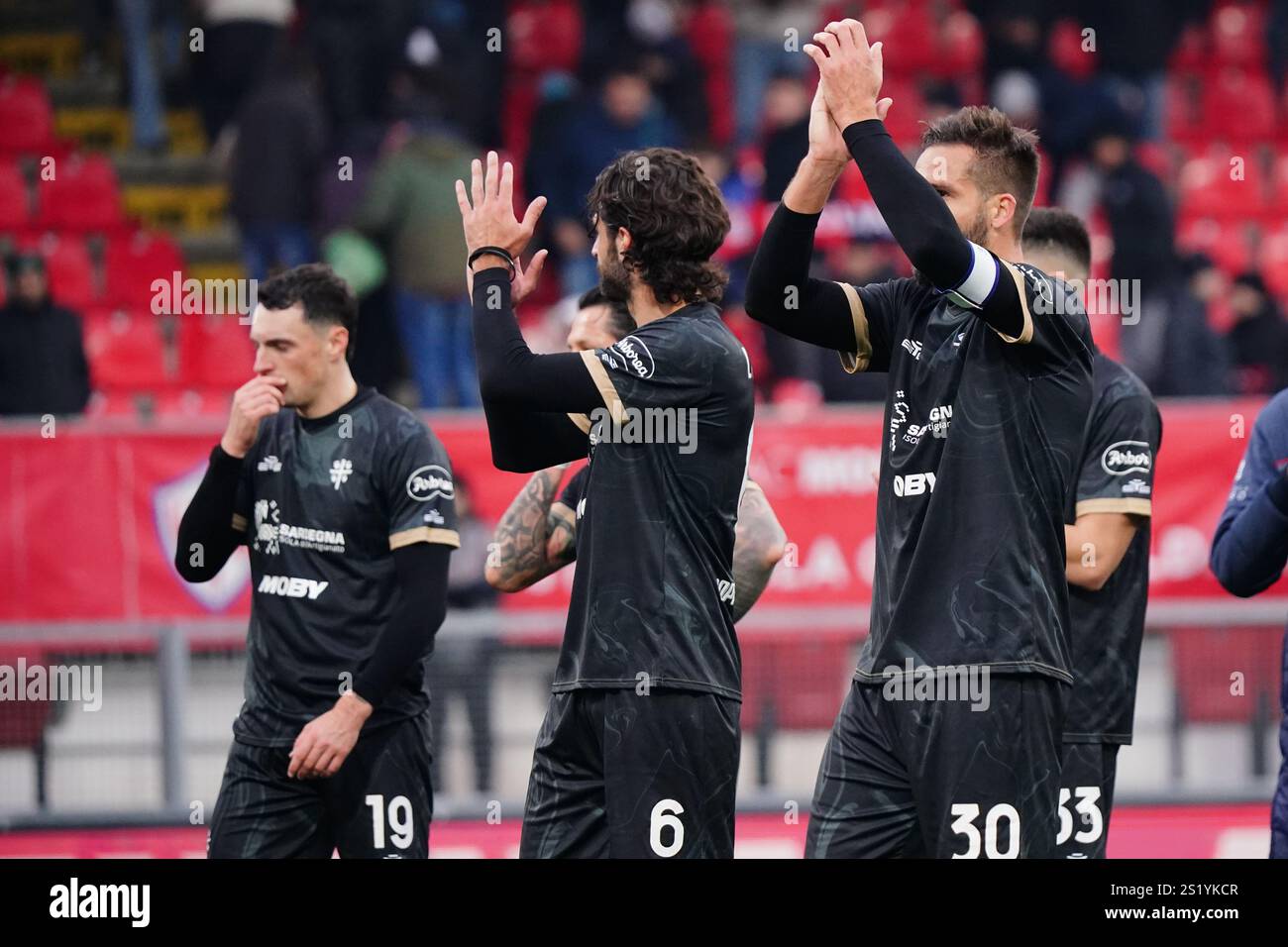 the team (Cagliari Calcio) celebrates the win during the Italian