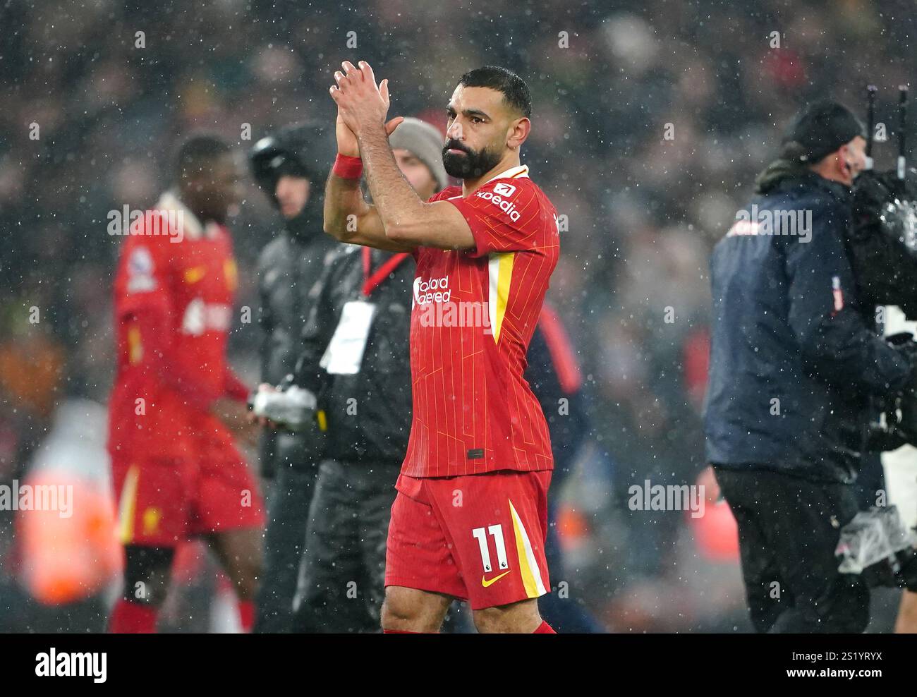 Liverpool's Mohamed Salah applauds the fans following the Premier ...