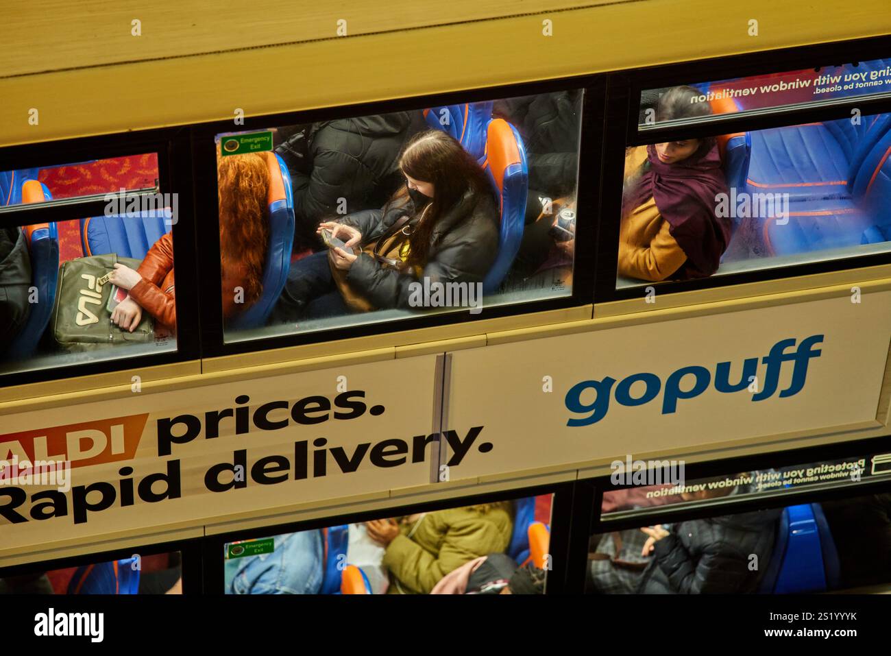 commuters on the Manchester Bee Network buses through the windows Stock ...