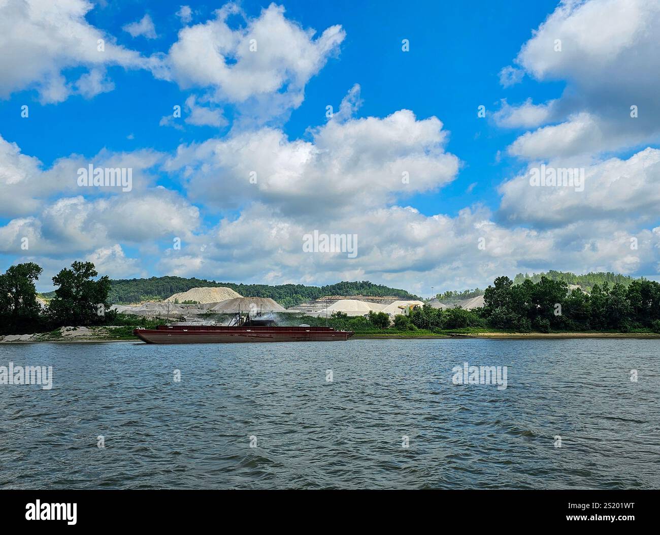 Mulzer Crushed Stone, Cape Sandy, Leavenworth, Indiana. A barge is being loaded with sand from the quarry. - Smartphone Captured Stock Image