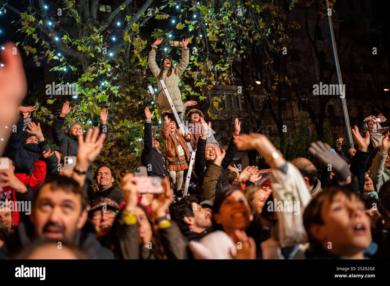 People attend the traditional "Cabalgata de Reyes" parade in Madrid