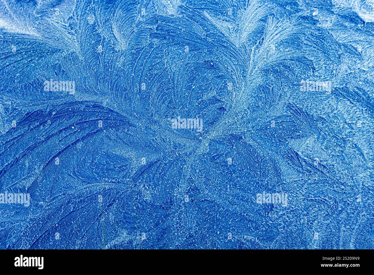 Frost pattern on a car bonnet Stock Photo
