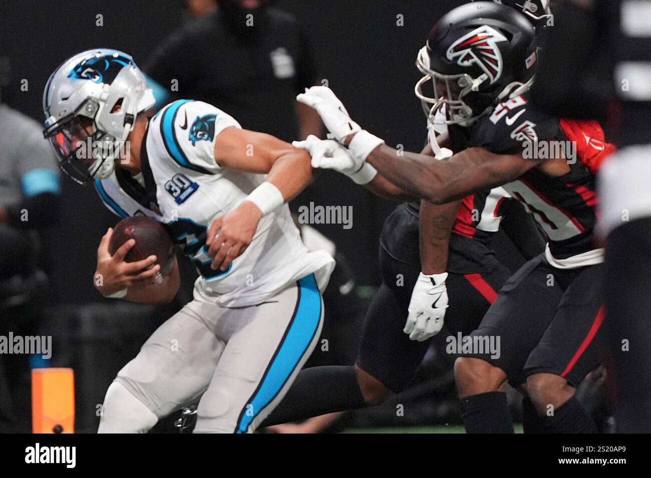 Carolina Panthers quarterback Bryce Young scores against the Atlanta ...