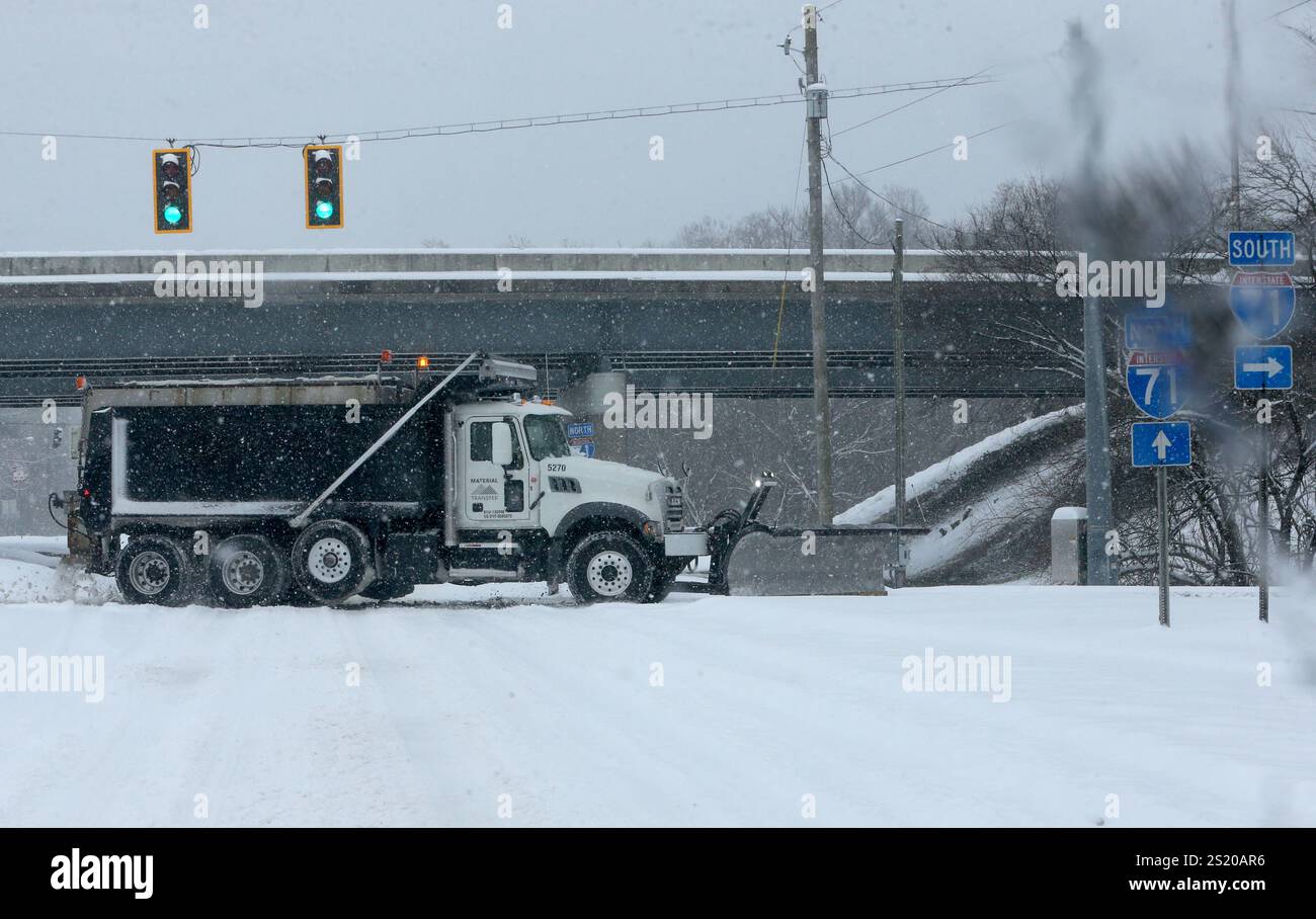 Kentucky road crews work to clear snow covered roads from the first ...
