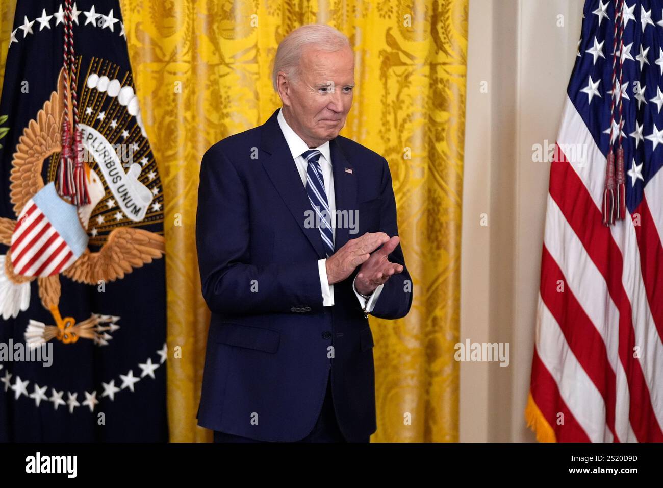 President Joe Biden attends a ceremony to sign the Social Security Fairness Act in the East Room