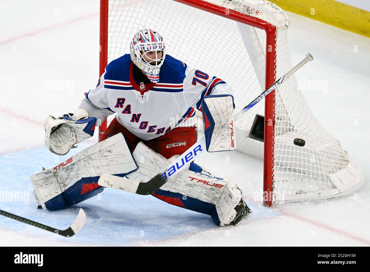 New York Rangers goalie Louis Domingue makes a save during the second ...
