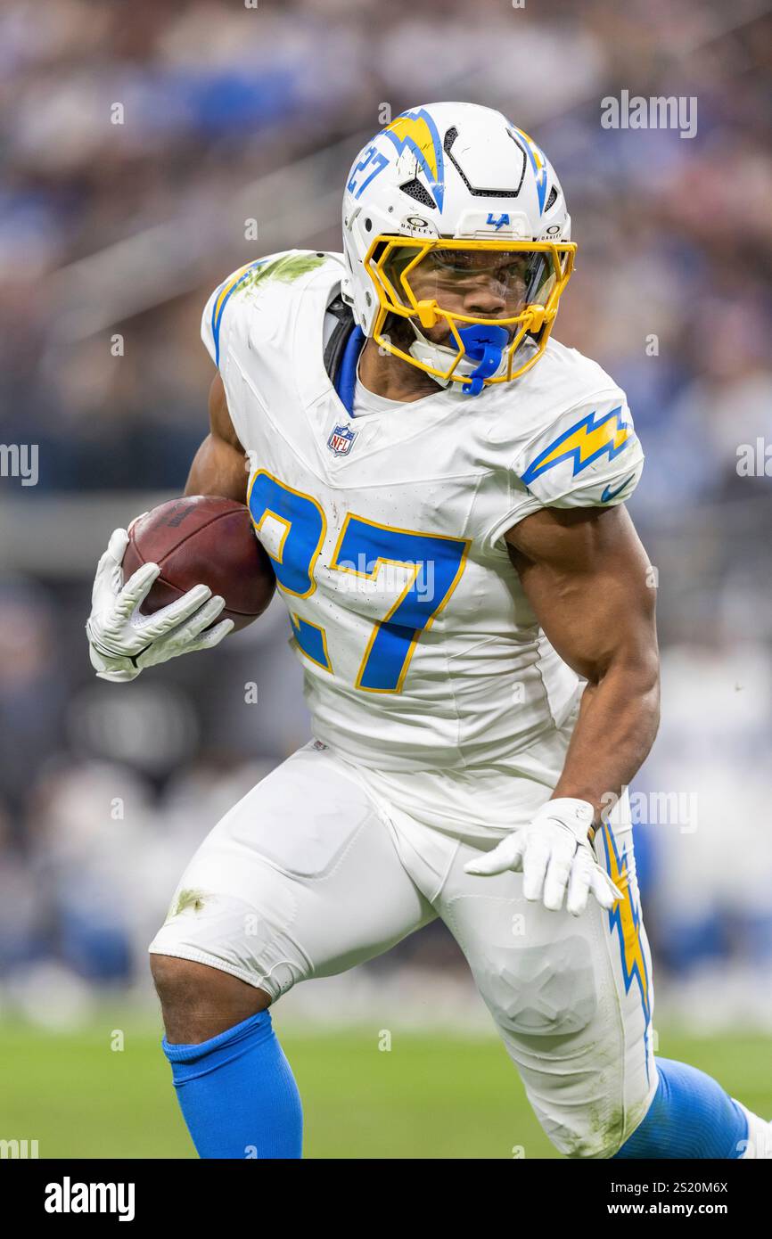 Los Angeles Chargers Running Back J K Dobbins 27 Runs The Ball Los Angeles Chargers Running Back Jk Dobbins 27 Runs The Ball Against The Las Vegas Raiders In An Nfl Football Game Sunday Jan 5 2025 In Las Vegas Ap Photojeff Lewis 2S20M6X