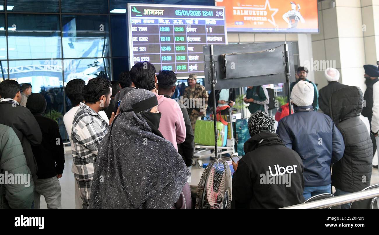PATNA, INDIA JANUARY 5 Passengers gather after several flight