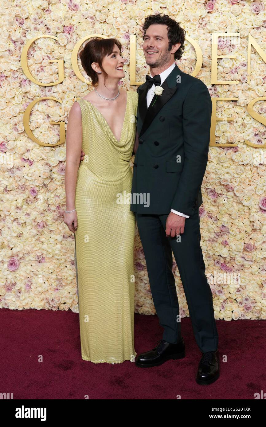 Leighton Meester, left, and Adam Brody arrive at the 82nd Golden Globes