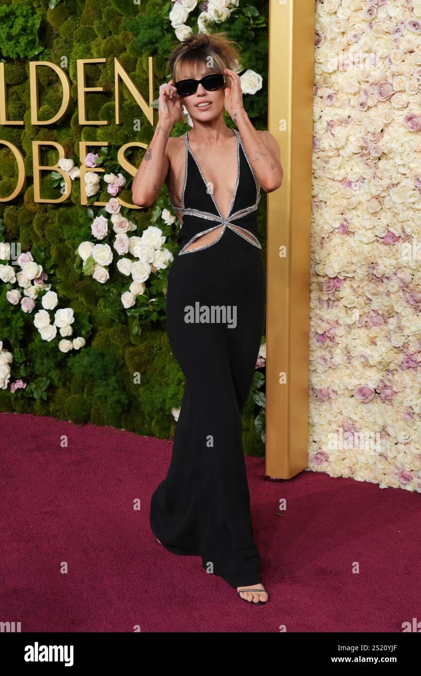 Miley Cyrus arrives at the 82nd Golden Globes on Sunday, Jan. 5, 2025