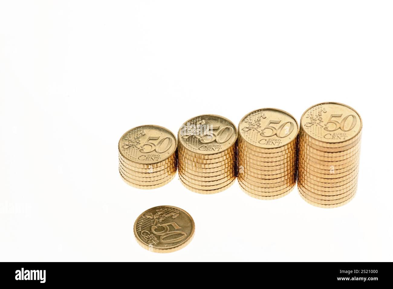 Some stacks of euro coins on a white background Stock Photo - Alamy
