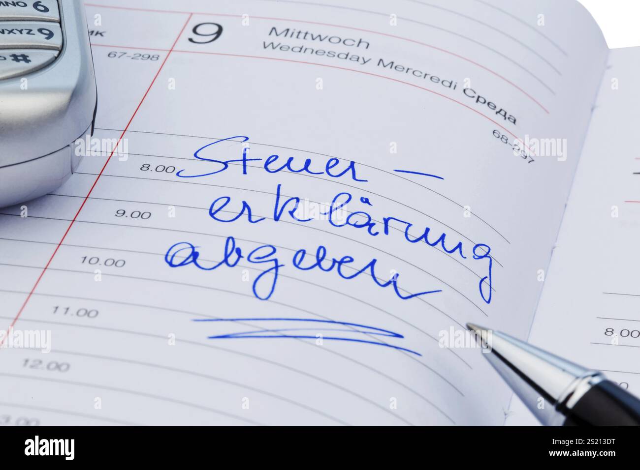A date is entered in a calendar: Submit tax return Austria Stock Photo A date is entered in a calendar: Submit tax return Austria Stock Photo