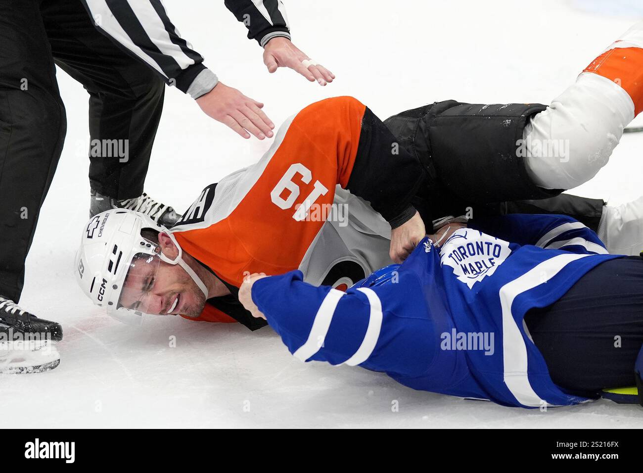 Philadelphia Flyers right wing Hathaway (19) takes down Toronto