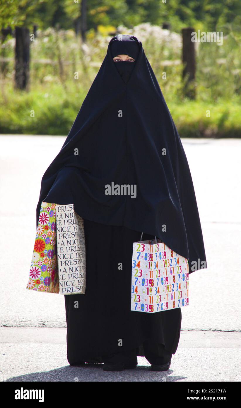 Symbolic photo Islam. Muslim woman with burqa is veiled. Austria Stock ...