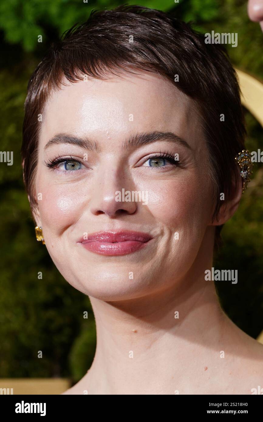 Emma Stone arrives at the 82nd Golden Globes on Sunday, Jan. 5, 2025, at the Beverly Hilton in