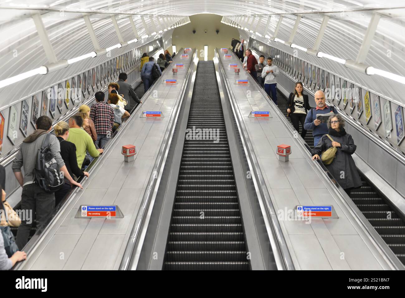 Long escalator down to the subway station deep underground