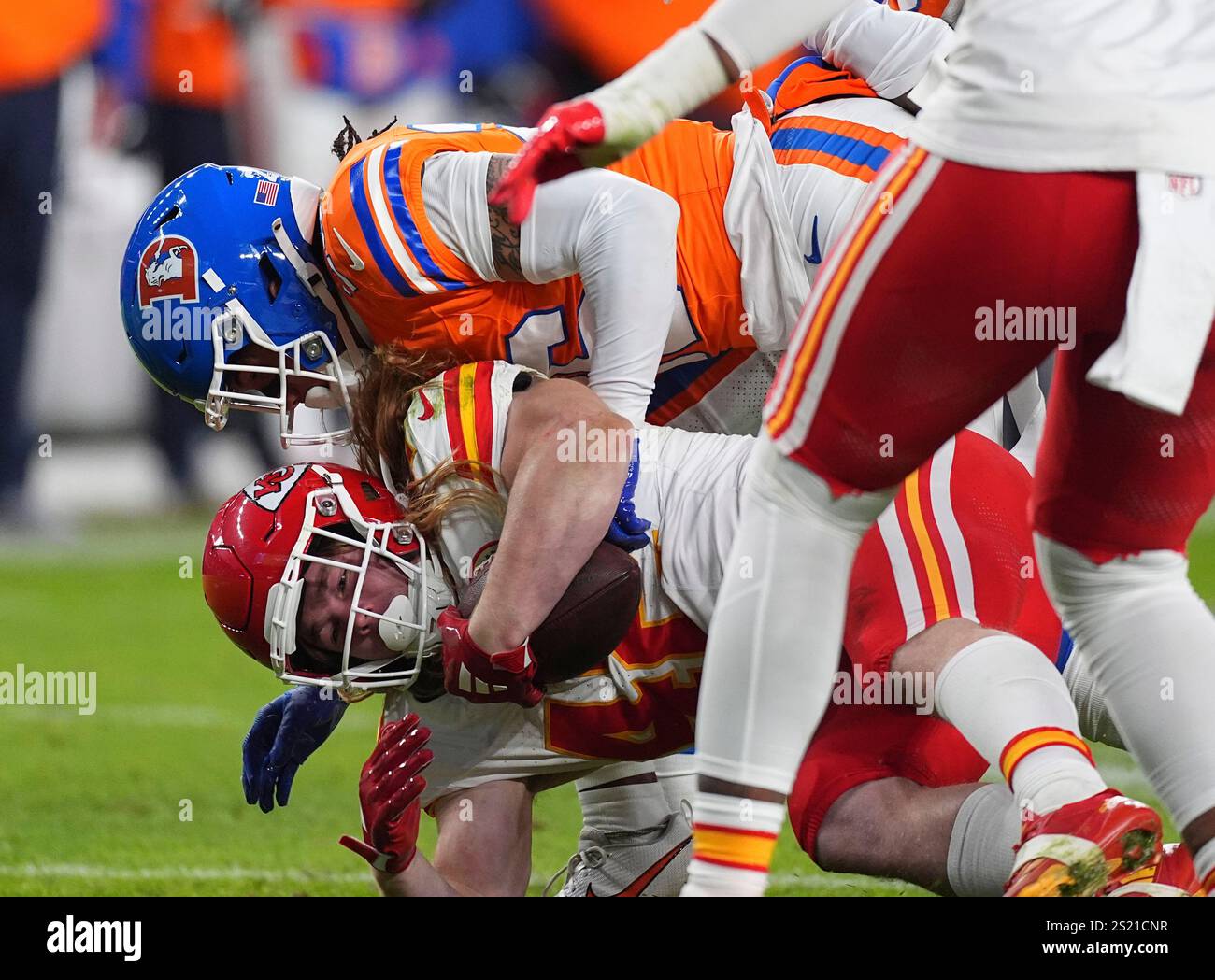 Devin Key Football Denver Broncos safety Devon Key, top, tackles Kansas City Chiefs ...