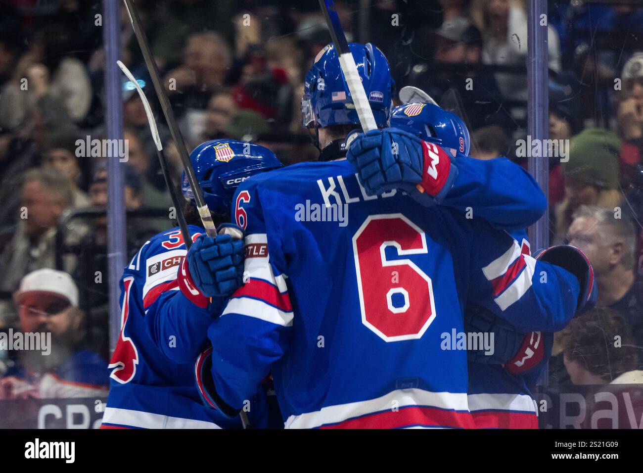 250105 James Hagens of USA celebrates with team mates after scoring 11