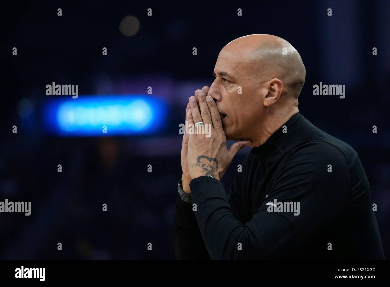 Sacramento Kings interim head coach Doug Christie gestures during the
