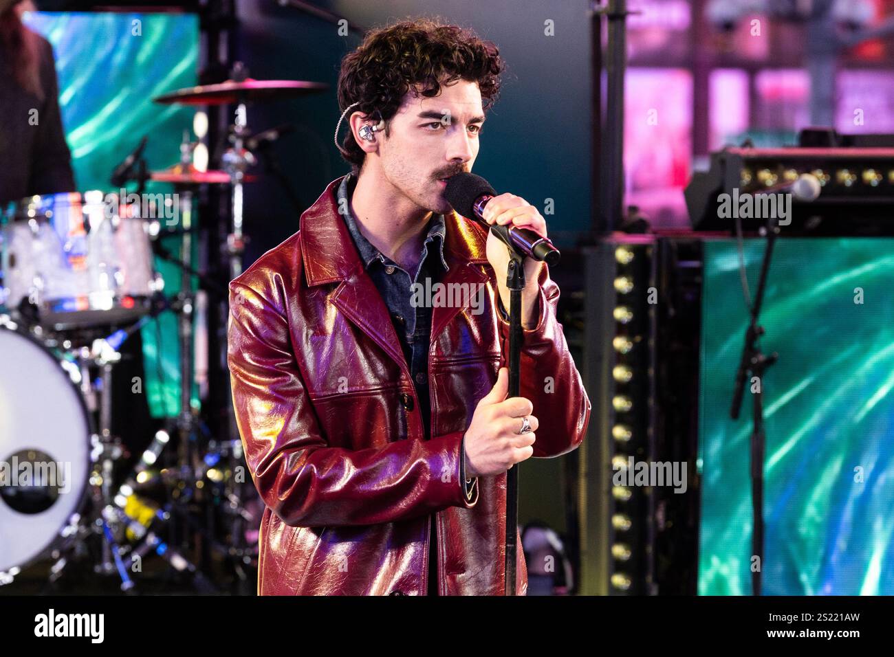 Joe Jonas of The Jonas Brothers performs on stage during Times Square ...