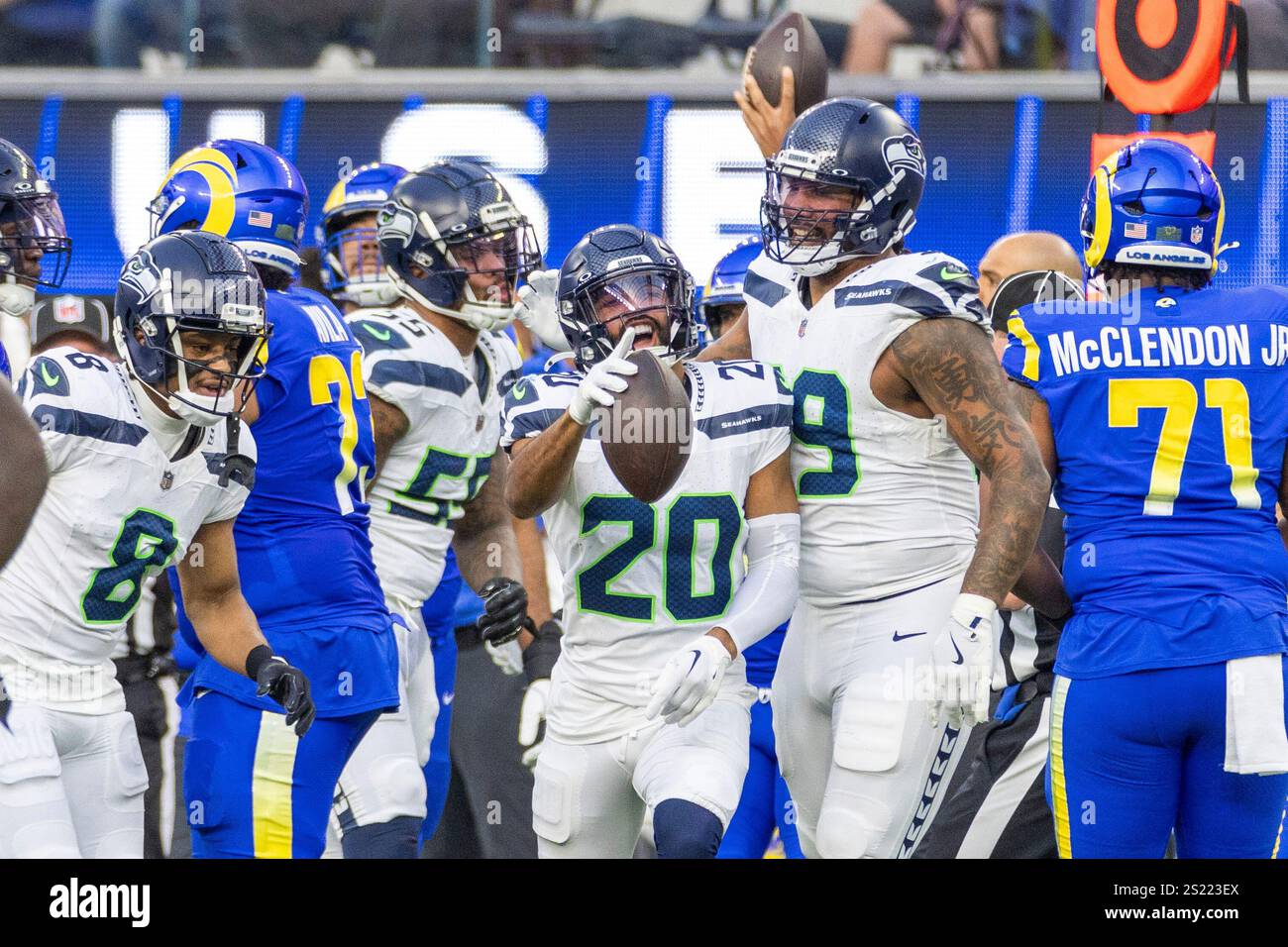 Seattle Seahawks safety Julian Love (20) runs with the ball