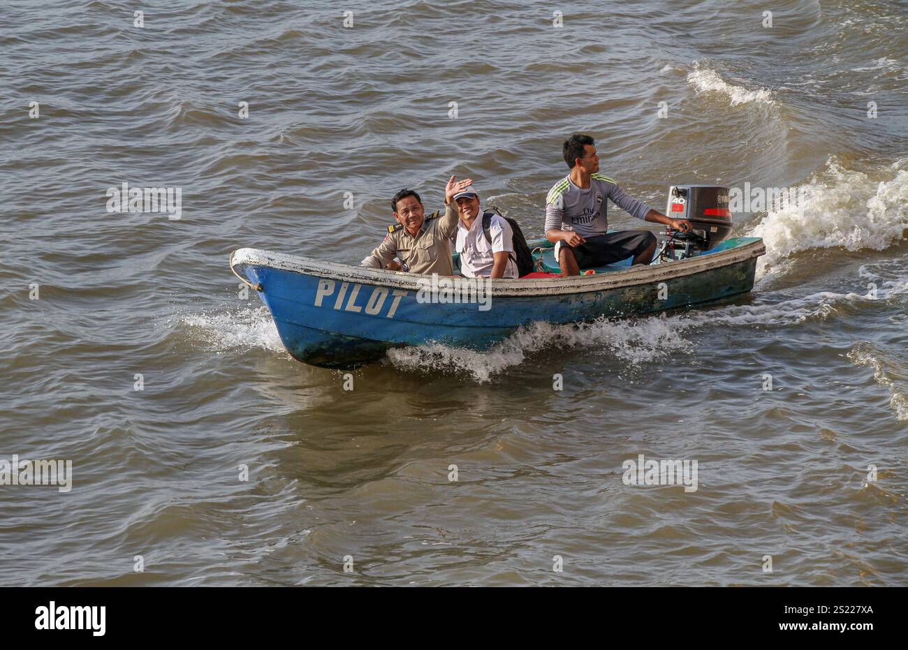 Leuk Daek, Cambodia. Jan 05, 2025: A maritime pilot & a Cambodian ...