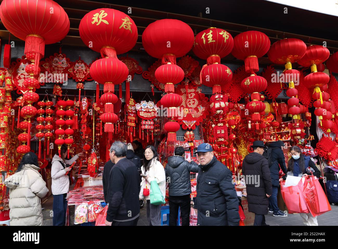 People shop Spring Festival goods at a market in Shanghai, China, 3