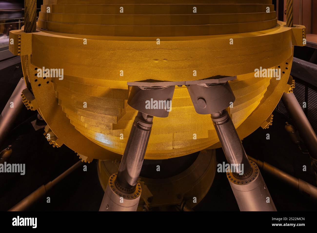 steel pendulum that serves as a tuned mass damper inside the Taipei 101. It is visible to all visitors on the 88th through 92nd floors and It can redu Stock Photo