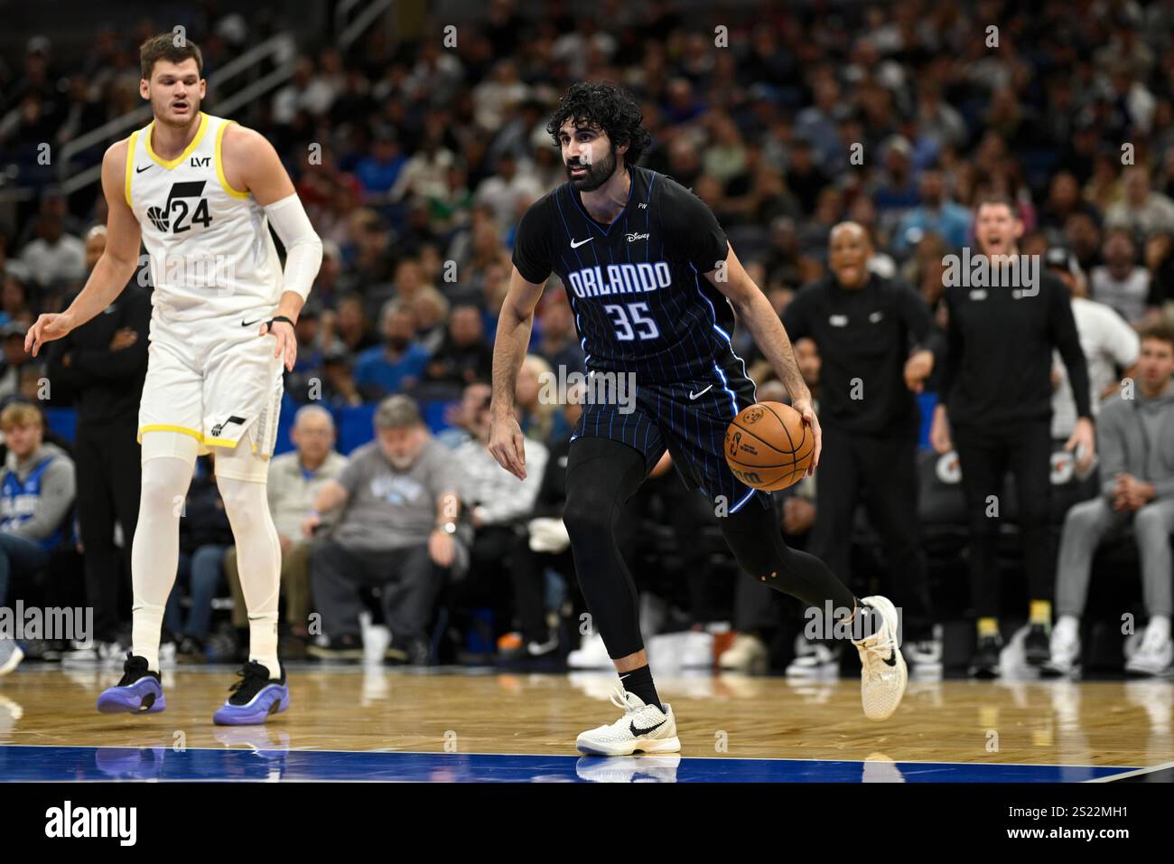 Orlando Magic center Goga Bitadze (35) controls the ball as Utah Jazz