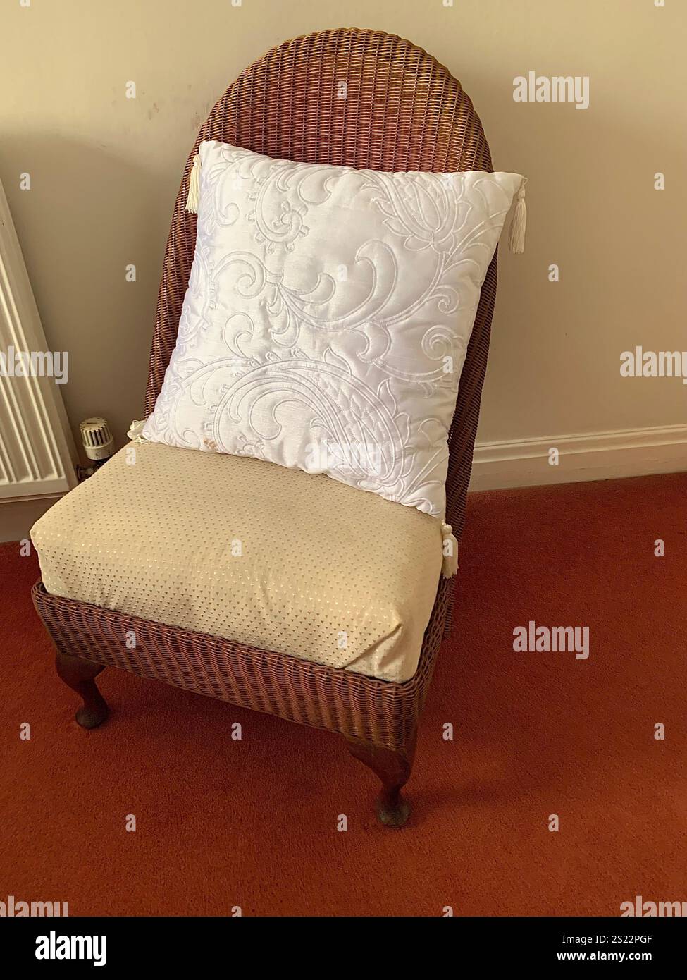 seat chair old Victorian sit sitting room bedroom chair wood cushion floor carpet white cream colour padded pad legs low brown reeded type Childs - Smartphone Captured Stock Image
