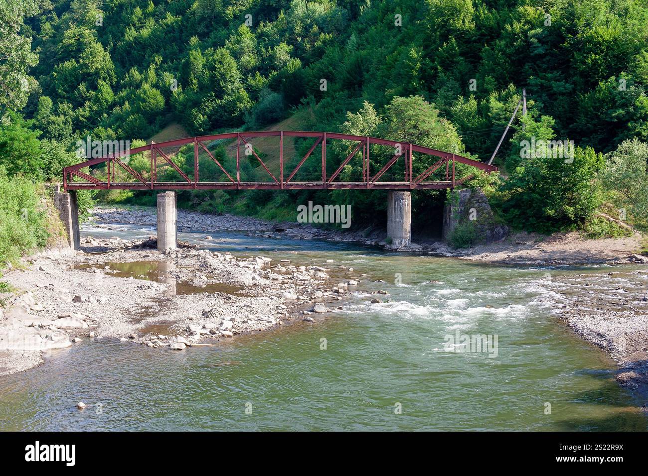tisza river near rakhiv town. green environment. carpathian mountain landscape in summer. place where two stream join. outdoor nature background Stock Photo