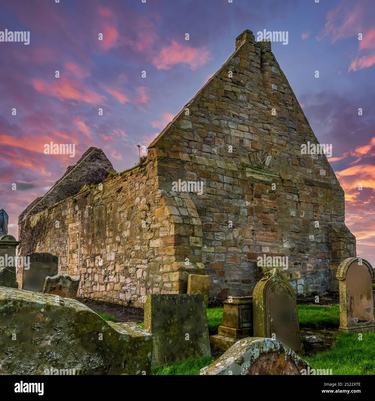 Prestwick Old Parish Church & Graveyard Dedicated to St Nicholas surrounded by an old burial ground. In the church yard are the graves of Covenanter a Stock Photo