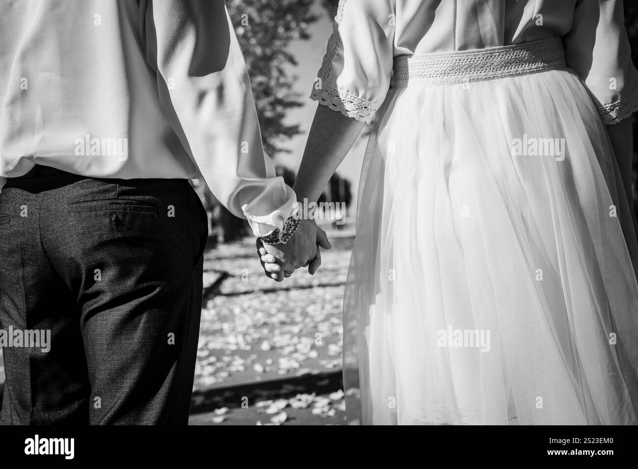 Romantic Black and White Image of a Couple Holding Hands in Nature ...