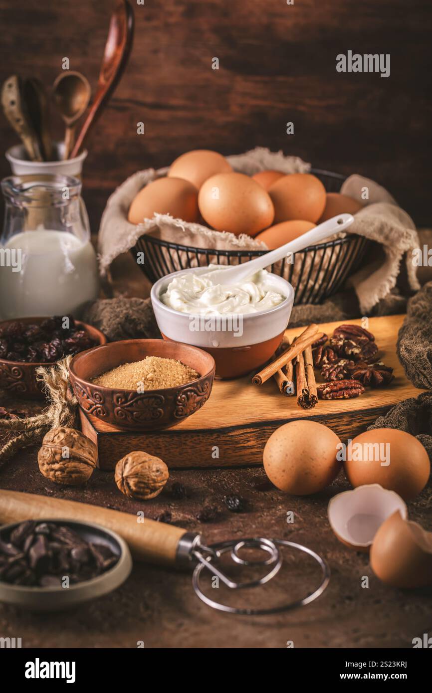 Assorted baking ingredients and kitchen utensils in brown tone Stock Photo