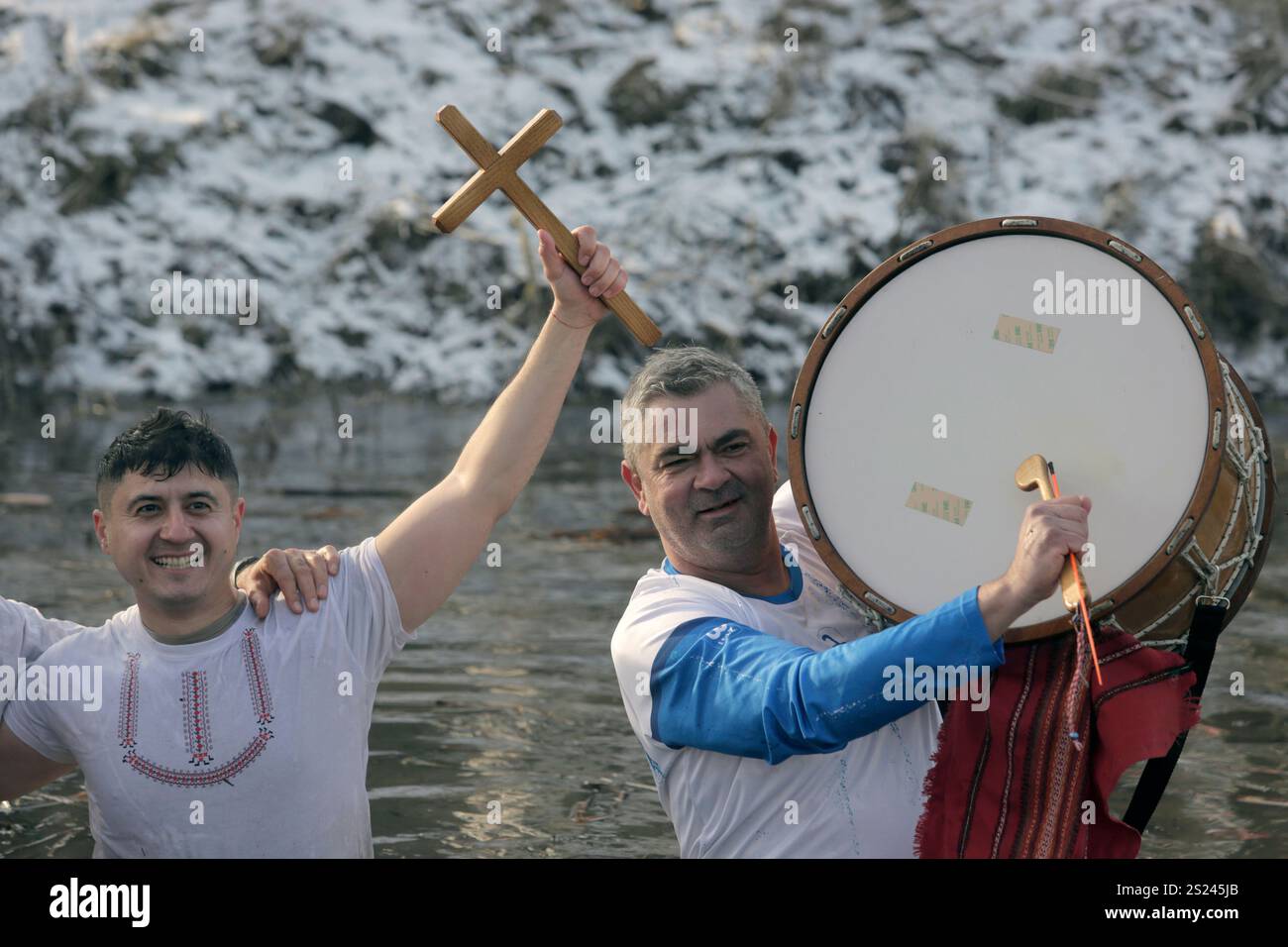 Bulgariana sing and dance and hold a wooden cross in the Lesnovska