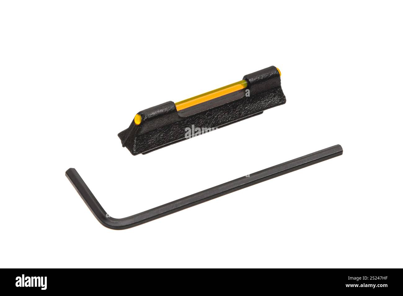 Black front sight with a yellow fiber optic insert and an accompanying ...
