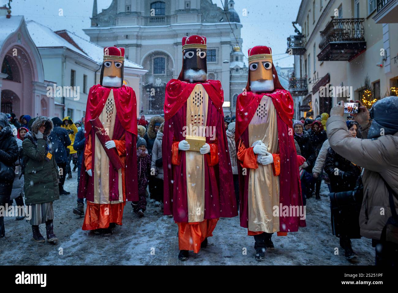 Lithuanians dressed as the Three Kings parade during the Epiphany Day