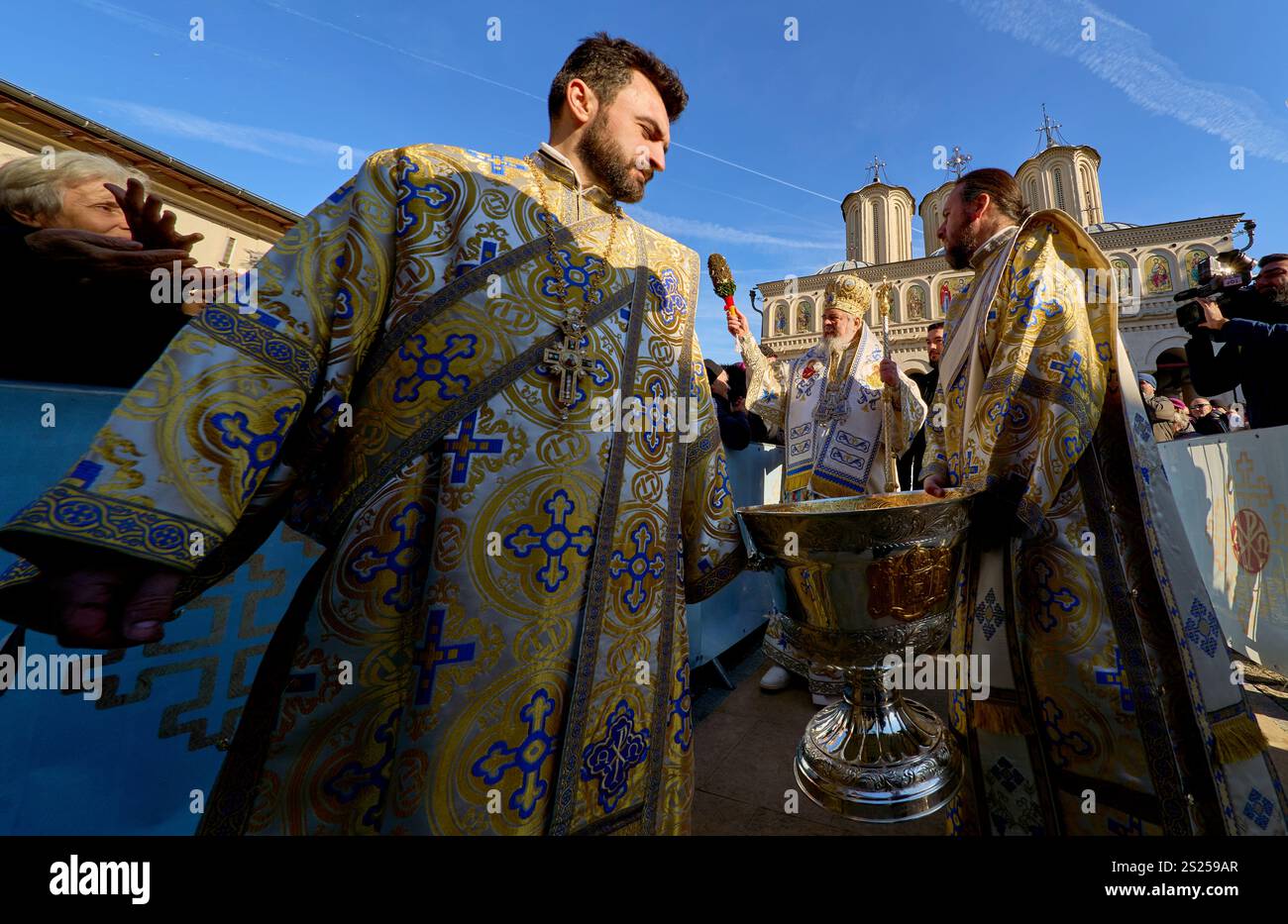 Bucharest, Romania. 6th Jan, 2025 Patriarch Daniel (C) takes Great