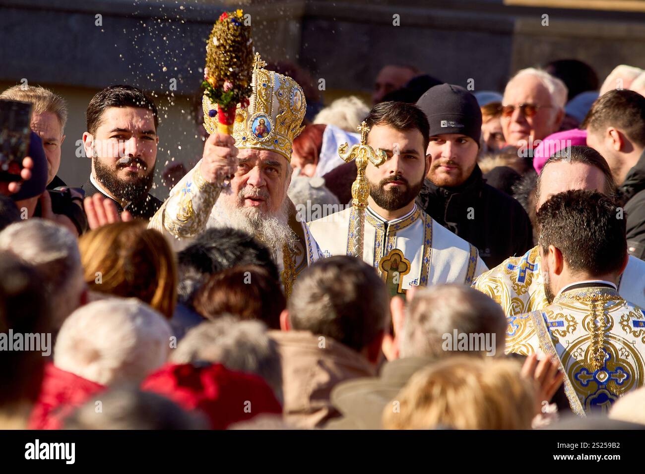 Bucharest, Romania. 6th Jan, 2025 Patriarch Daniel (C) sprinkles the