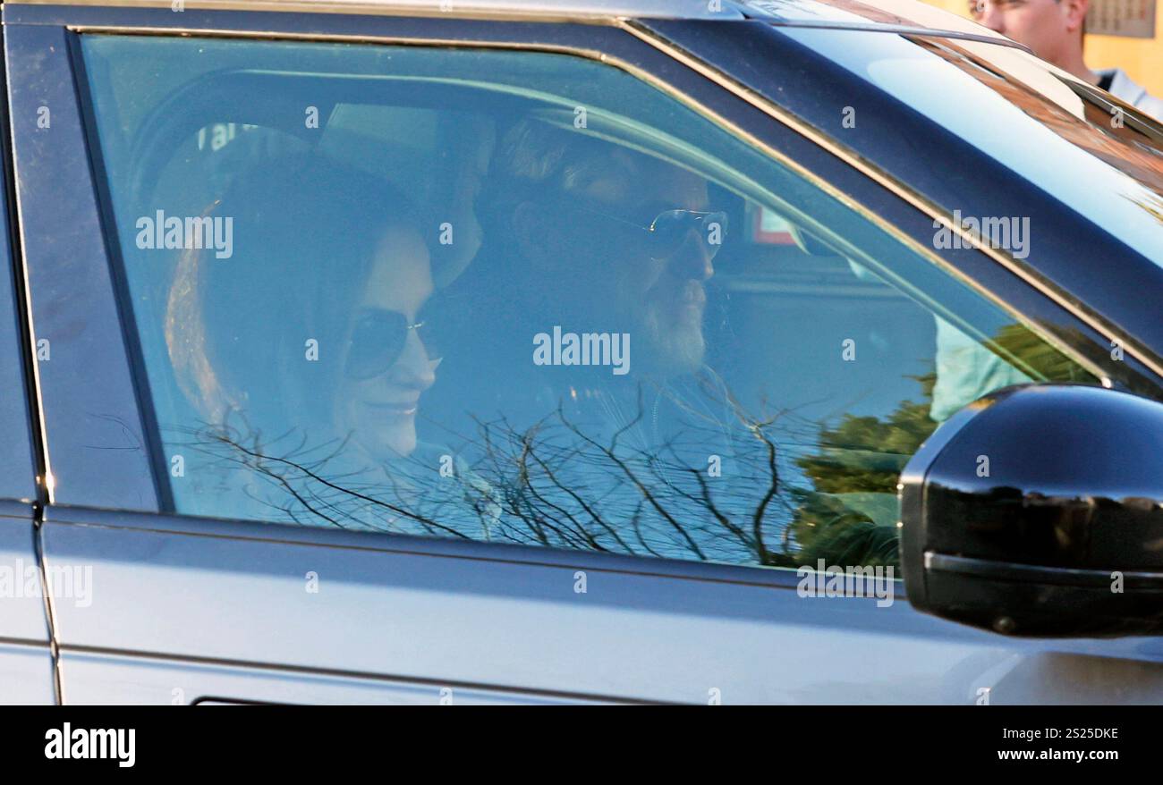 Telma Ortiz and Robert Gavin Bonnar arrive at the home of Jesús Ortiz