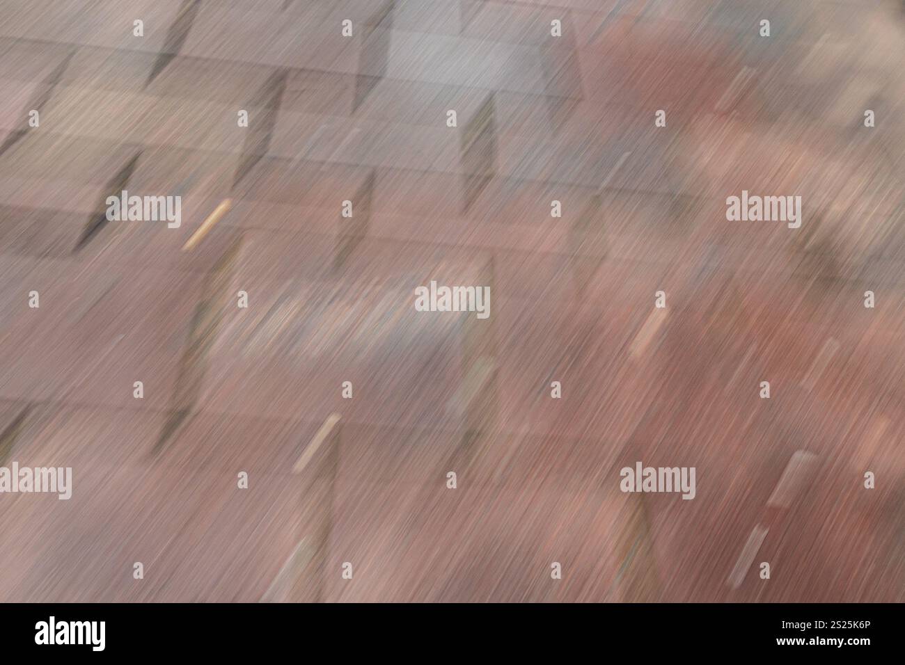 A view of a textured paved surface in a city area.The ground shows ...