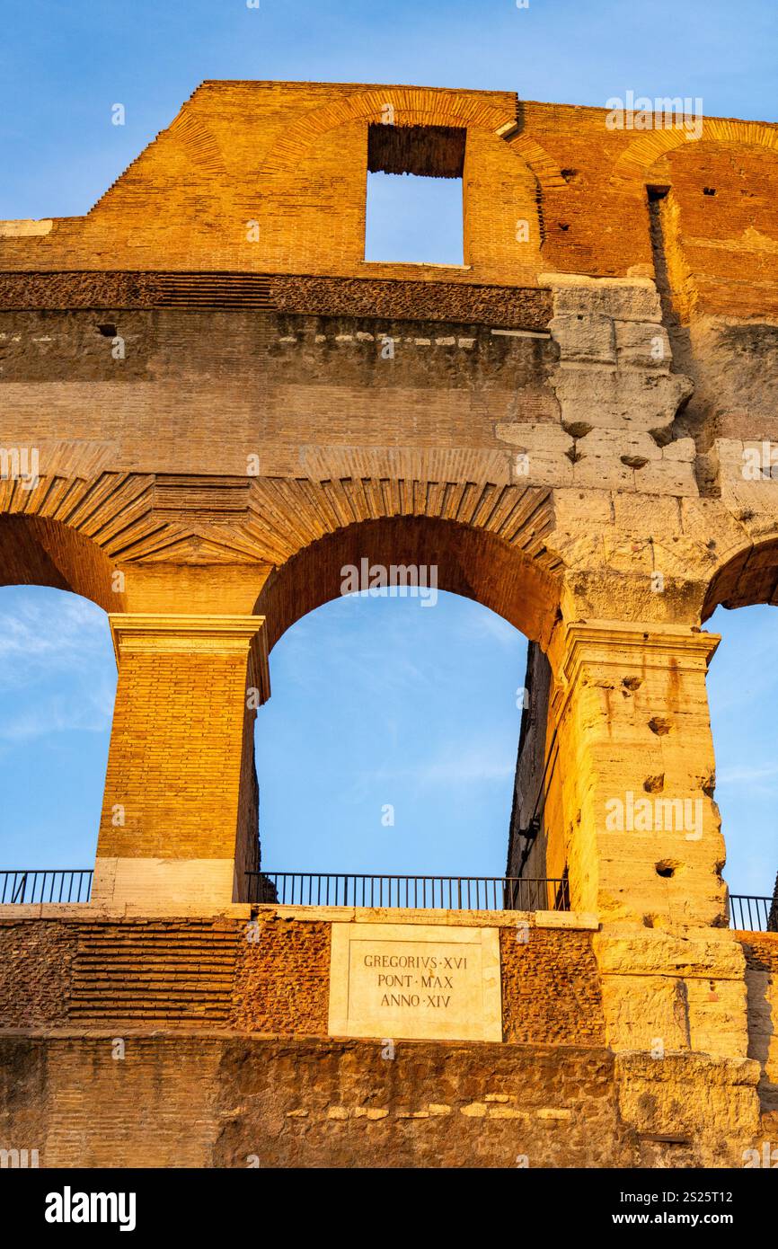 Amptitheatee Rome The ancient Roman Colosseum or Flavian Amphitheater with golden sunset ...