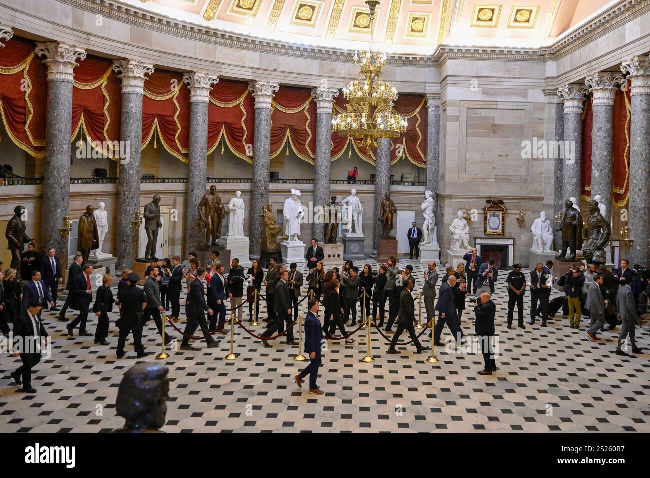 Members Of The Senate Walk Through Statuary Hall To The House Chamber