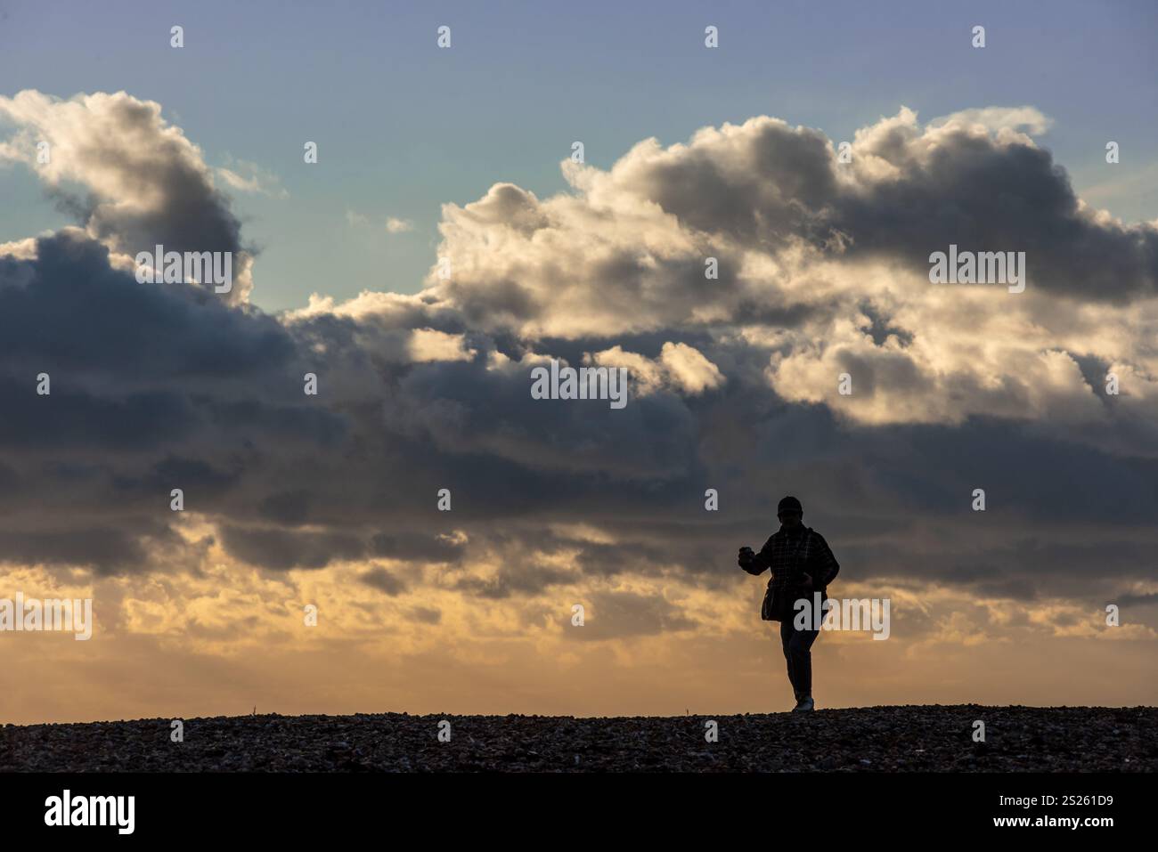 Brighton, January 6th 2025 A solitary man watches the sunset on